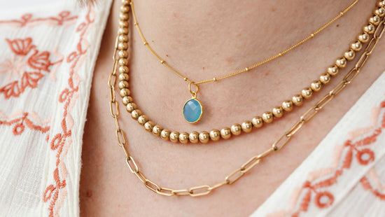 How to layer your necklaces with a little less tangled drama